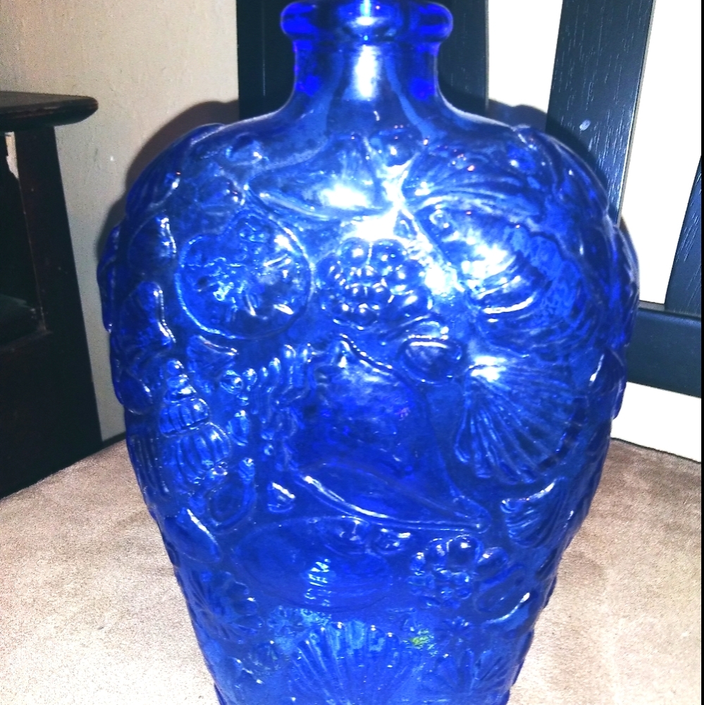 Blue bottle with flower print